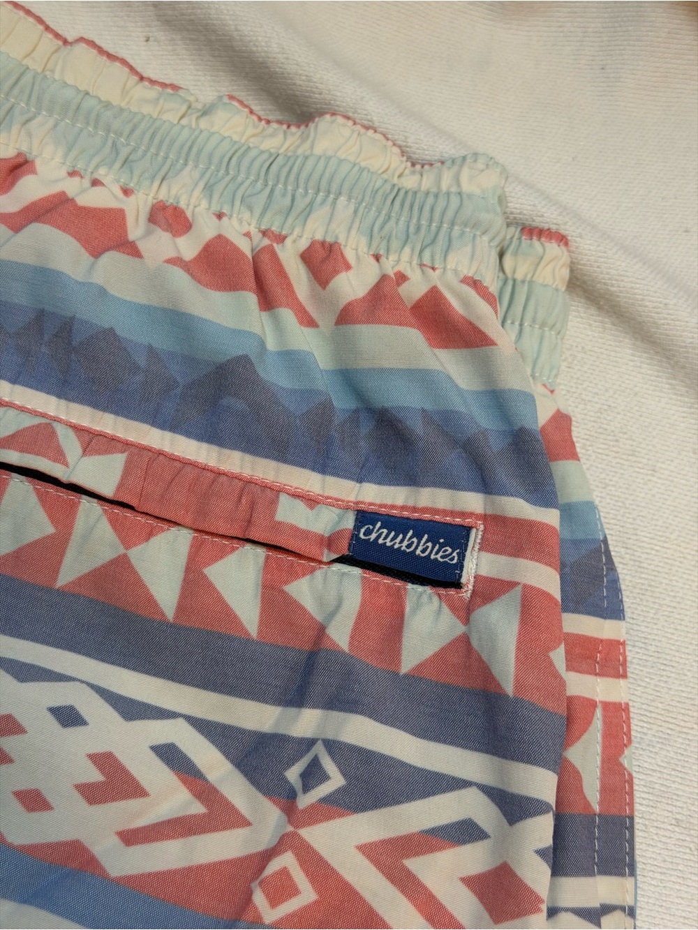 chubbies Coral and Light Blue Geo-Stripe Hybrid Shorts